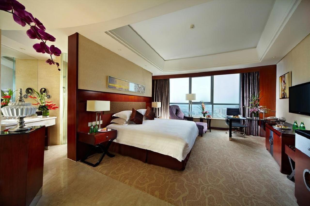 Jurong Yukun New Century Hotel Jiangsu Room photo